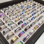 100 Pcs Stainless Steel Rings Bulk Set with Box – Assorted Mixed Styles Heart & Stripe Bands for Women, Men & Couples, Colorful Wholesale Jewelry Gift Pack, Random Assortment